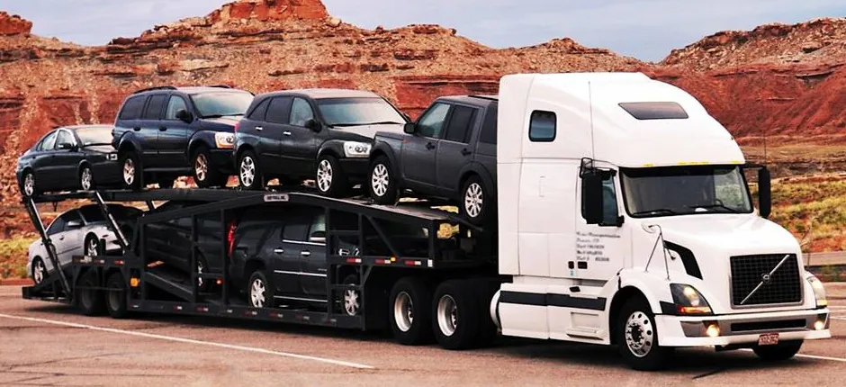 Car carrier truck loaded with vehicles for auto shipping